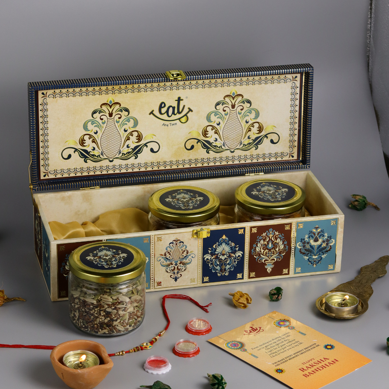 

EAT ANYTIME Rakhi Box Timeless Bond Premium Rakhi Gift Box Featuring Almonds, Cashews, Raisins & Beautiful Rakhi Perfect Gift Box for Brother/Sister