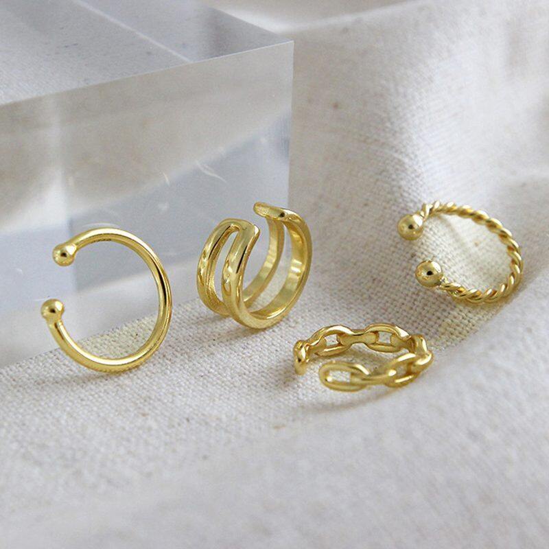 

Lussocollezioni Looped Gold Ring with Classic Twist