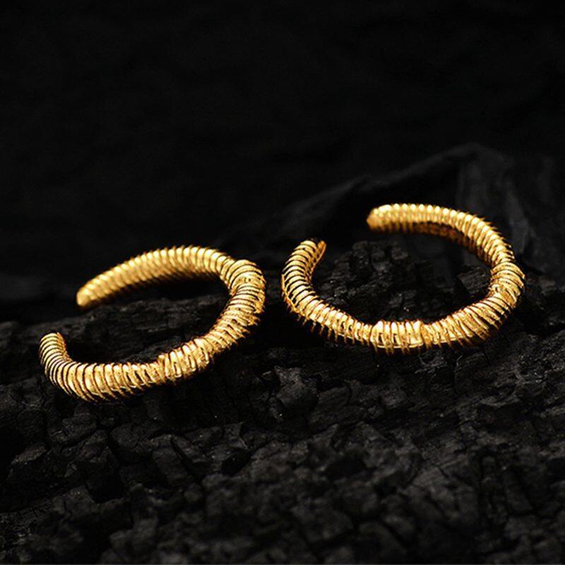 

Lussocollezioni Golden Caterpillar Ring with Intricate Design