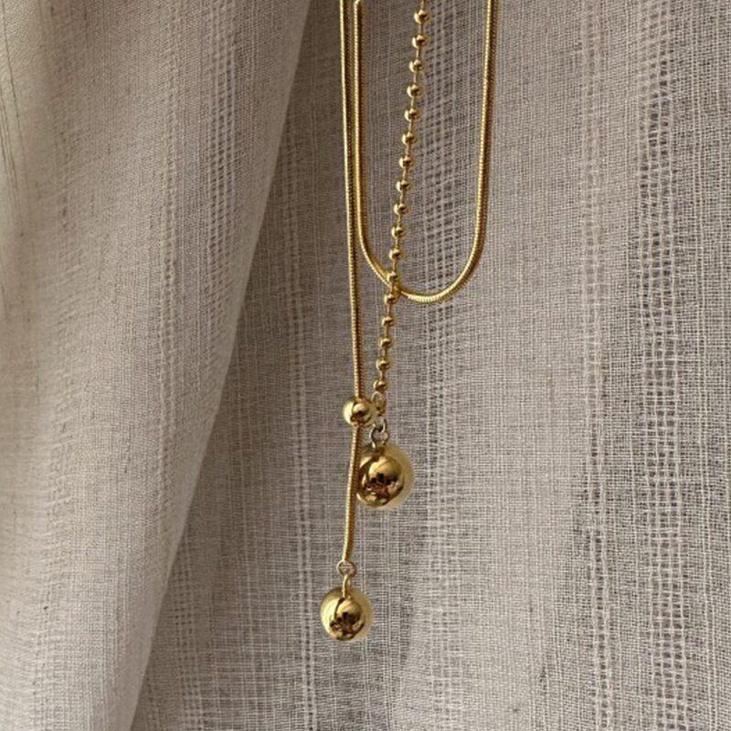 

Lussocollezioni Golden Duo Necklace with Classic Appeal