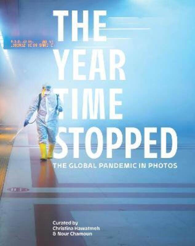 

The Year Time Stopped: The Global Pandemic in Photos.Hardcover,By :Hawatmeh, Christina - Chamoun, Nour