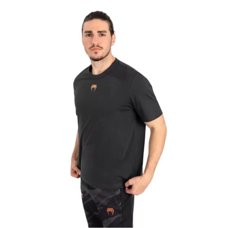 

UFC ADRENALINE BY VENUM FIGHT WEEK MENS SHORT- SLEEVE T-SHIRT BLACK/GOLD XLARGE