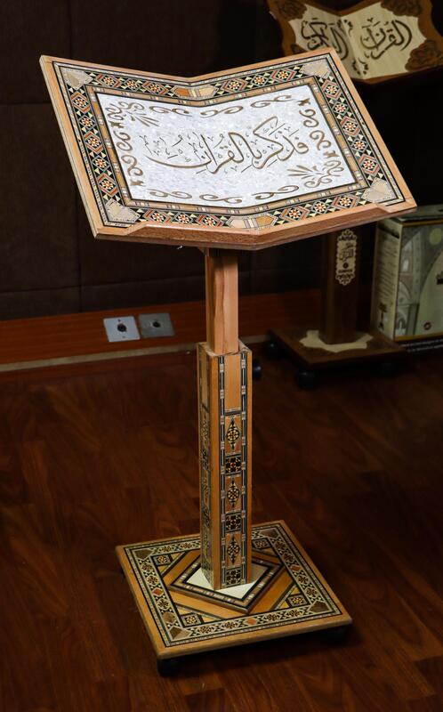 The holder of the Qur’an with the ancient Damascene mosaic.