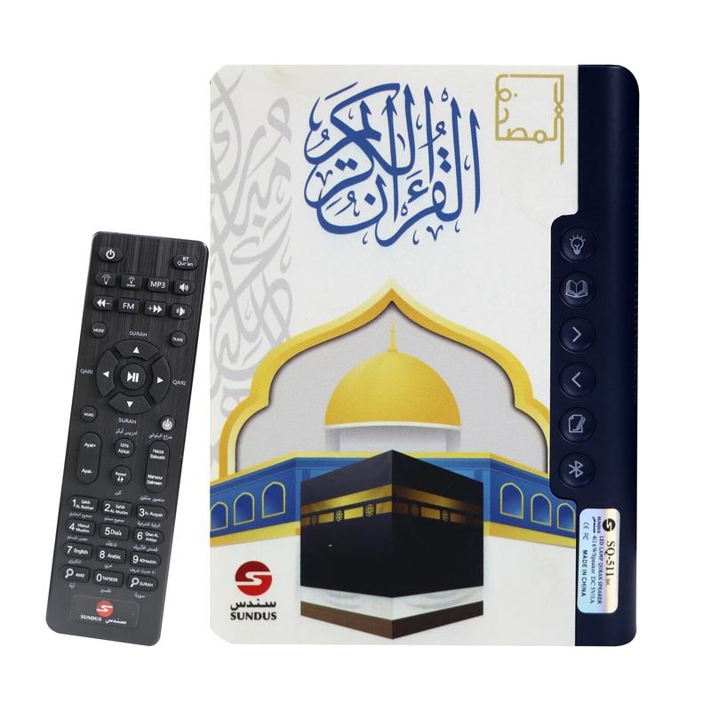 The Holy Qur'an speaker with a remote control.